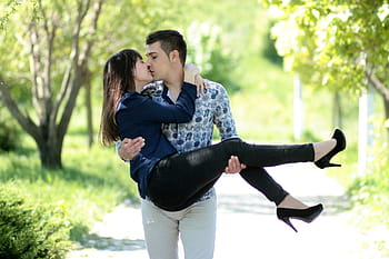 man, carrying, woman, kissing, daytime, couple, love, kiss, hug, beauty, park