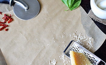 yellow cheese, background, cutting board, pizza cutter, wooden, cutting, wood, parmesan cheese, salt shaker, salt grinder, basil