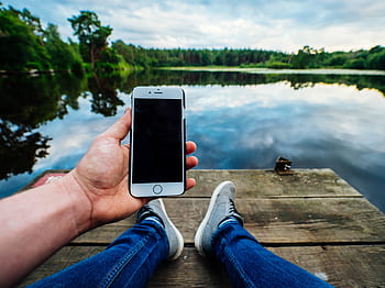 people, man, apple, iphone, cellphone, technology, nature, water, river, lake, wood