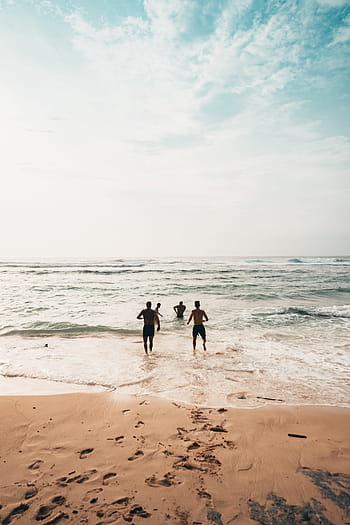 four, person, beach, daytime, sand, sea, water, seashore, ocean, travel, outdoors