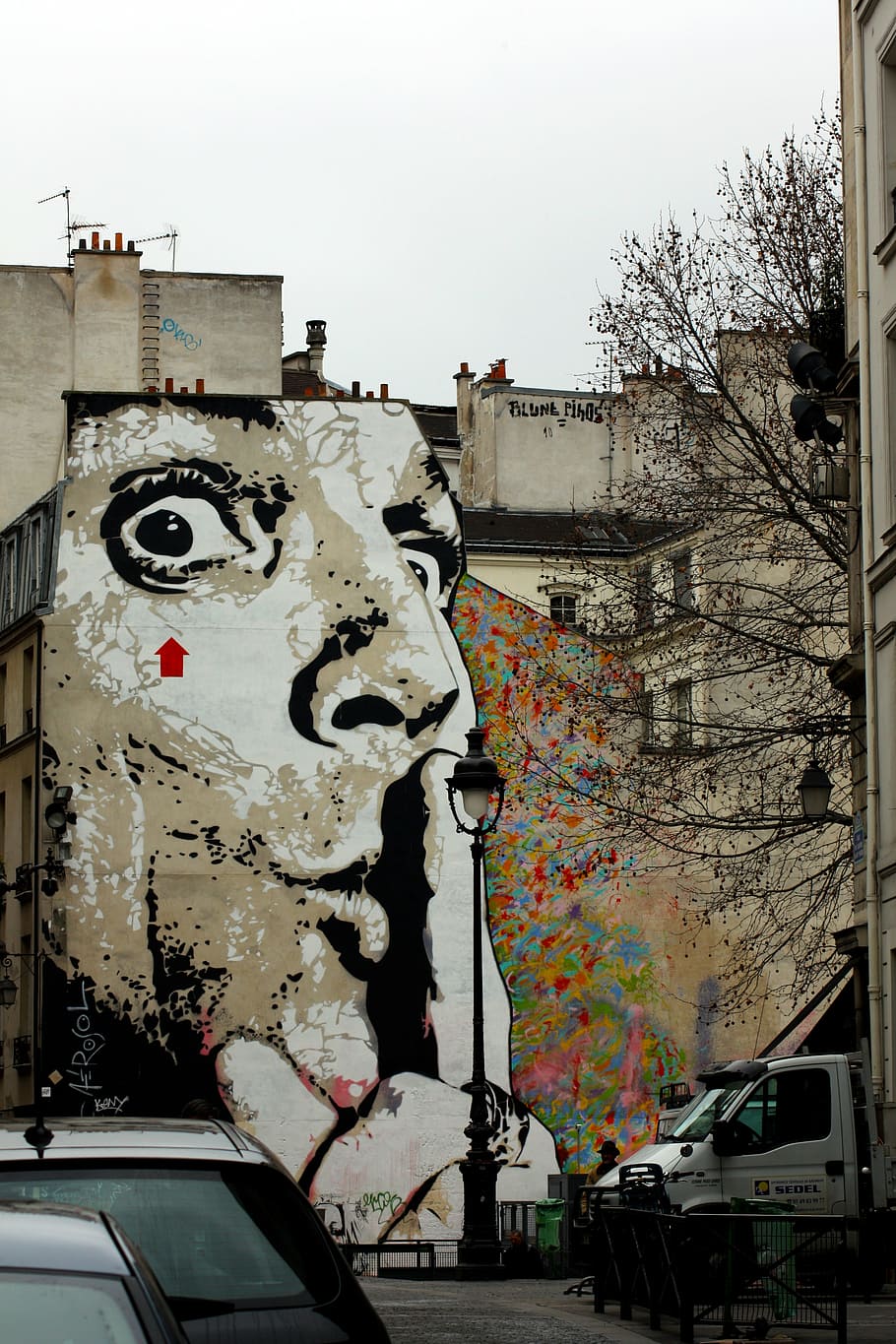 man, finger, lips building wall paint, art, color, abstract, salvador dalí, surrealism, muse, paris, hidden