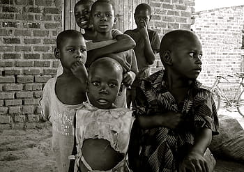 grayscale photo, Children, Uganda, Africa, Poverty, developing country, poverty reduction, living conditions, brick wall, childhood, adult