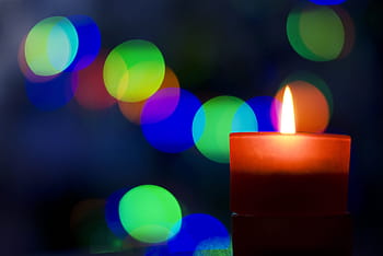 brown, pillar candles ,with, candleswith, multi-colored, string lights, night time, pillar, candles, colored, string, lights
