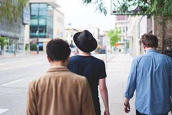three, men, walking, road, green, tree, daytime, street, people, back, guys