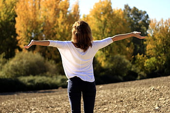 woman, white, elbow-sleeve blouse, black, fitted, jeans, happiness, joy, pure air, dom, enthusiasm