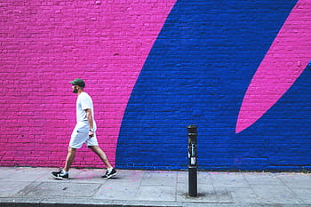 man, walks, past, coloured, brick wall, east, london, East London, people, graffiti, street Art