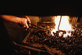 person doing bonfire, fire, people, man, smith, blacksmith, heat, smoke, ash, charcoal, steel