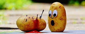 two yellow fruits, potatoes, ketchup, murder, blood, funny, fun, knife, kill, fork, katoffelmord