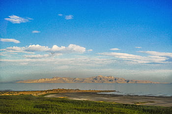landscape photography, brown, hills, across, calm, body, water, distance, green, trees, blue