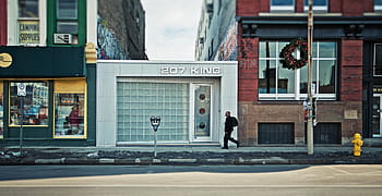 2017 king stall, man, walking, pass, white, king, building, daytime, architecture, infrastructure, sky