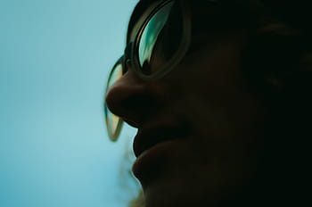 person wearing eyeglasses, persons, wearing, blue, tint, white, framed, sunglasses, people, man, male