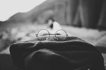 eyeglasses with frames, depth of field, eyeglasses, scarf, day, love, focus on foreground, outdoors, adult, people, adults only