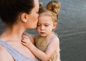 woman, carrying, girl, kissing, forehead, people, mother, child, kid, baby, kiss