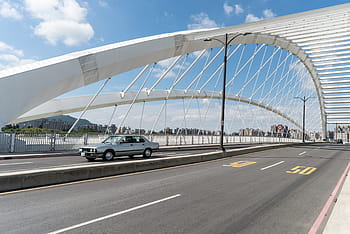 car, vehicle, road, street, lane, architecture, bridge, structure, blue, sky, cloud