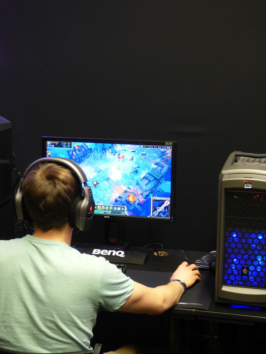 boy, holding, computer mouse, playing, mmorpg game, game, the strategy, computer, a computer game, monitor, the player