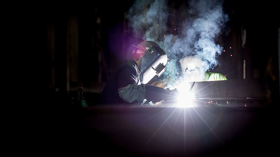 person, wearing, gray, welding mask, fabricating, steel frame, dark, light, masks, people, smoke