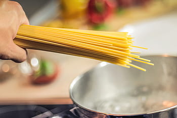 person, holding, uncooked pasta, spaghetti, pasta, noodles, cooking, food, italian, hand, meal