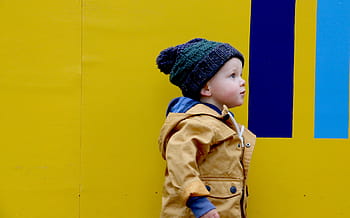 child, standing, yellow, blue, painted, walls, people, kid, coat, bonnet, boy