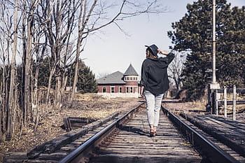 woman, wearing, black, jacket, walking, railway, walking on, people, lazy, hat, fashion