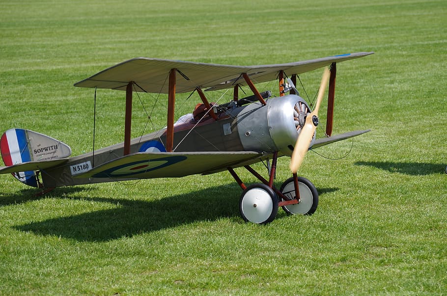 Aircraft, Land, Model, airplane, air Vehicle, grass, outdoors, green Color, biplane, aircraft Wing, flying