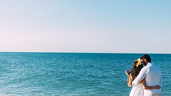 man, woman, standing, ocean, coupe, near, calm, sea, clear, sky, people