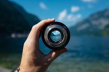 person, holding, scope, front body, water, lens, camera lens, focus, focusing, hand holding lens, photography