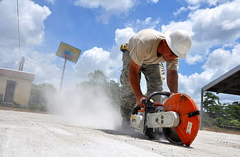 person, holding, red, gray, concrete, saw, construction, worker, job, labor, hardhat