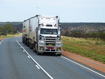 white, cargo truck, concrete, road, blue, sky, daytime, white cargo, truck, concrete road, blue sky