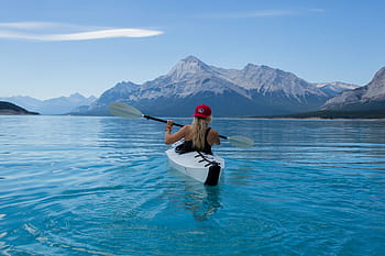 woman kayaking, calm, body, water, mountain alps, distance, daytime, woman, kayaking, body of water, mountain