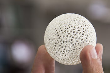 person, holding, white, plastic mesh ball, ball, 3d printing, design