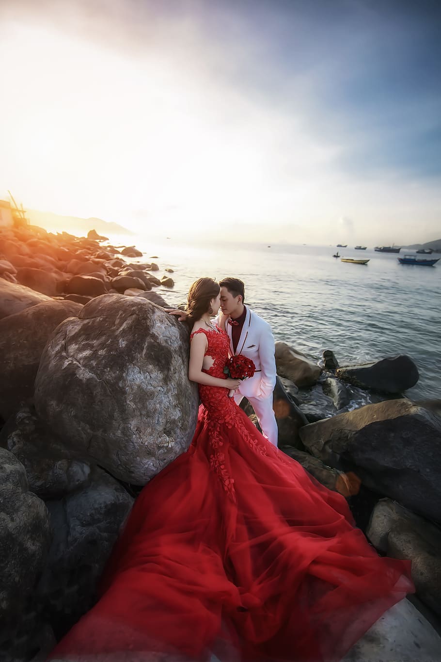 woman, wearing, red, dress, man, suit jacket, surrounded, rocks, wedding, weddings, natural