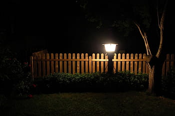 black, garden bolard, turned, garden, lantern, fence, meadow, at night, tree, artificial light, atmosphere