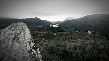 grey, clouds, fog, haze, hazy, moutains, water, fields, grass, rocks, trees