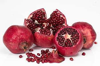 four red pomegranates, pomegranate, fruit, seeds, food, fresh, organic, healthy, vegetarian, vegan, sweet