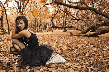woman, sitting, ground, forest, sepia, photography, wearing, black, sleeveless, mini, dress