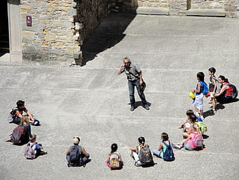people, street, sitting, standing, daytime, man, front, children, lesson, back to school, education