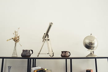 telescope, globe, vase, flowers, shelf, hooks, wall, display