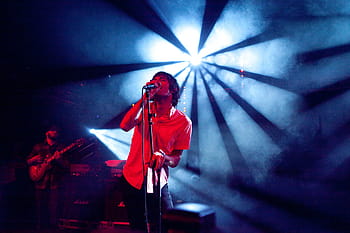 man using microphone, man, wearing, red, dress, shirt, singing, spotlight, music, studio, microphone