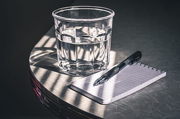 notepad, pen, cup, notes, notebook, writing, planning, ideas, agenda, journal, water
