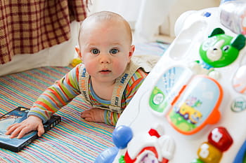 baby, lying, ground infront, activity walker, cute, child, happy, toddler, toy, little, fun
