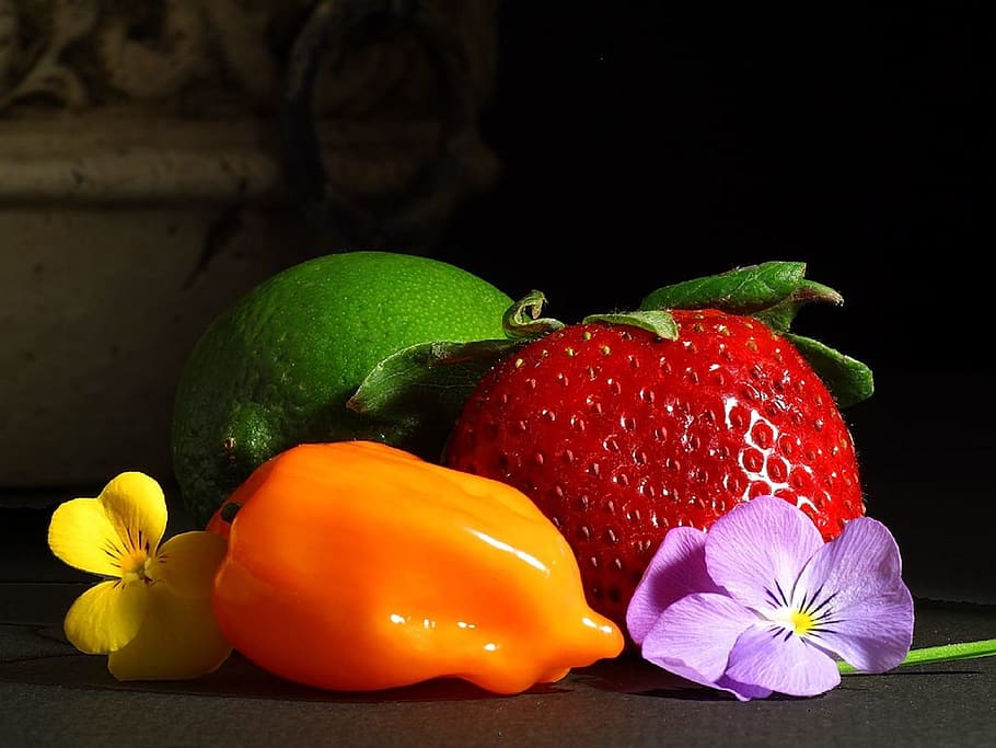 assorted fruits, fruits, still life, lime, strawberry, yellow pepper, flowers, edible, tasty, colorful, table