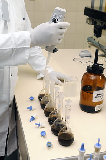 scientist, holding, dropper, filling, laboratory flasks, laboratory analysis, chemistry, work, clinical examination