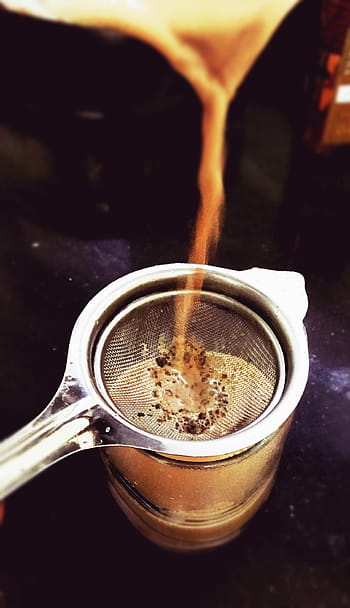 brown, liquid, filtered, stainless, steel strainer, clear, drinking glass, cup, tea, milk, chai