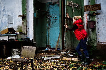 woman pushing door, girl, cinema, angry dog, camp, building, forest, horror, woman, person, model