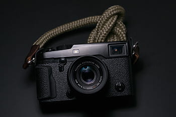 foto scarsamente illuminata, nero, macchina fotografica, telecamera, lente, fotografia, accessorio, macchina fotografica - attrezzatura fotografica, attrezzatura, singolo oggetto, in stile retrò