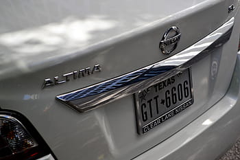 nissan altima, white sedan, car, license plate, hood, chrome, metal, rear, break light, angle, horizontal