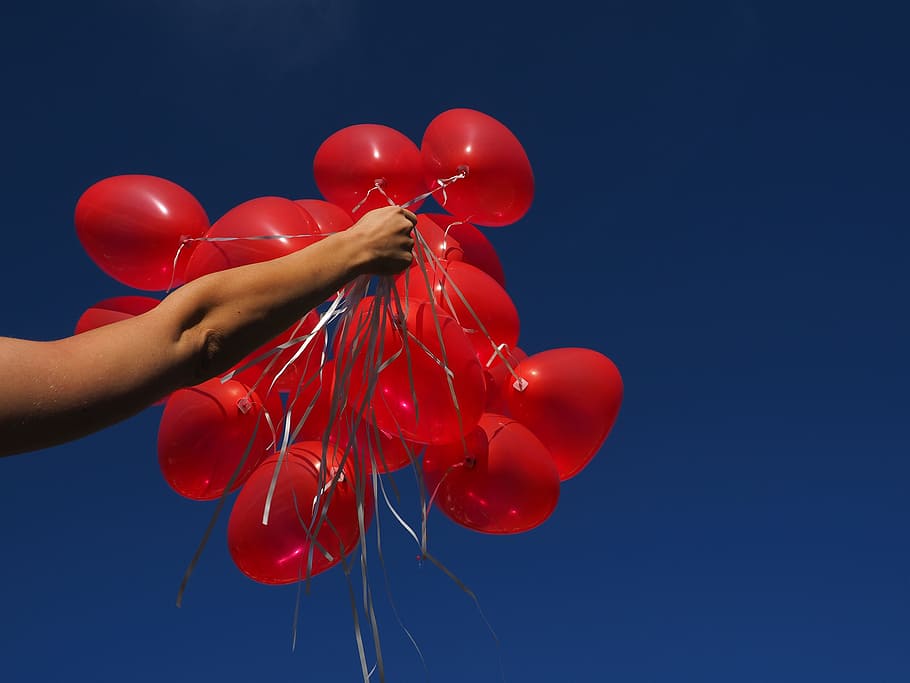 person, holding, bunch, red, balloons, daytime, detention, arm, hand, rise, upgrade