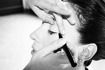 person applying eyeliner, makeup, eyes, nero, hair, mouth, woman, hairstyle, human Face, human Hair, hairdresser
