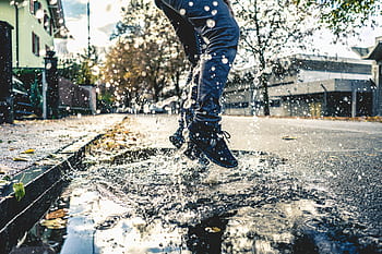 water, street, road, tree, outdoor, play, shoe, jeans, people, man, leg