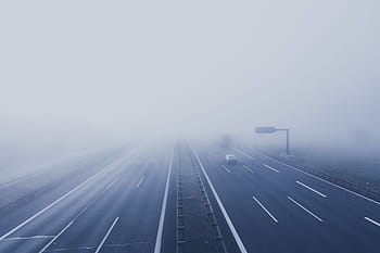 fog-covered highway, daytime, freeway, fog, vehicle, road, way, lane, car, path, expressway